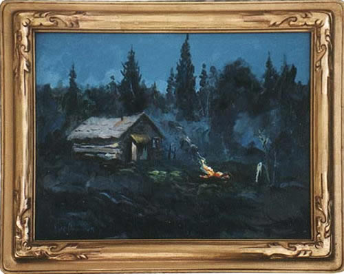 A picture of burning brush by an old cabin in Alaska.